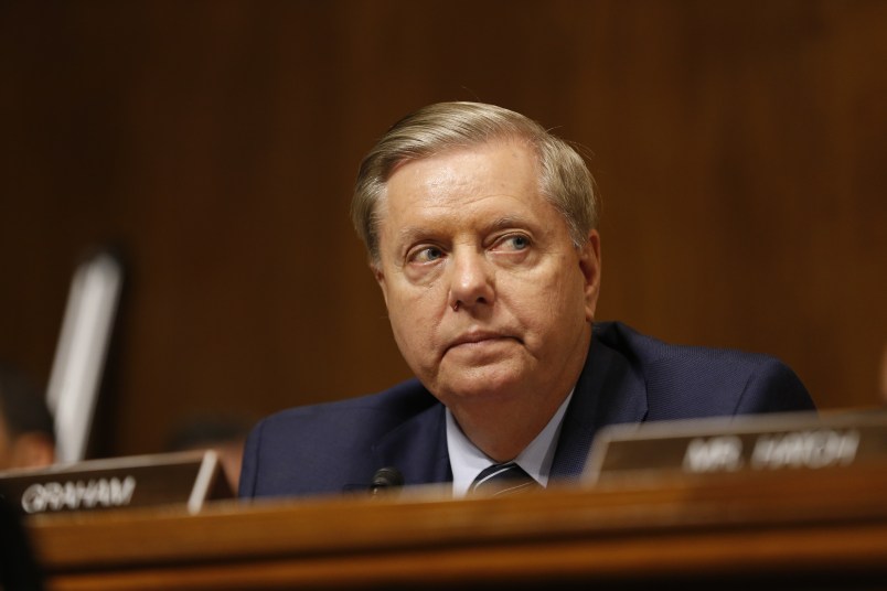 WASHINGTON, DC - SEPTEMBER 27:  Senator Lindsey Graham (R-SC) listens to Dr. Christine Blasey Ford speak before the Senate Judiciary Committee hearing on the nomination of Brett Kavanaugh to be an associate justice of the Supreme Court of the United States, on Capitol Hill September 27, 2018 in Washington, DC. A professor at Palo Alto University and a research psychologist at the Stanford University School of Medicine, Ford has accused Supreme Court nominee Judge Brett Kavanaugh of sexually assaulting her during a party in 1982 when they were high school students in suburban Maryland. (Photo By Michael Reynolds-Pool/Getty Images)