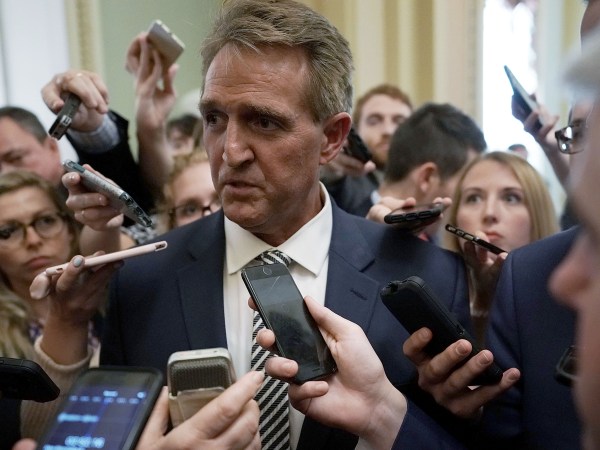 WASHINGTON, DC - SEPTEMBER 28:  U.S. Sen. Jeff Flake (R-AZ) speaks to members of the media after a meeting in the office of Senate Majority Leader Sen. Mitch McConnell (R-KY) September 28, 2018 at the U.S. Capitol in Washington, DC. President Donald Trump has ordered a one-week-long supplemental FBI background investigation into sexual assault allegations made against Supreme Court nominee Judge Brett Kavanaugh after Sen. Flake requested to delay the full Senate vote for the investigation.  (Photo by Alex Wong/Getty Images) *** Local Caption *** Jeff Flake