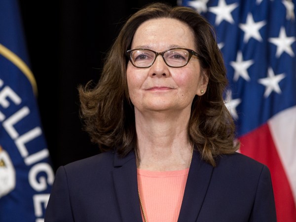 Gina Haspel, Director of the Central Intelligence Agency, stands after being sworn-in during a ceremony at CIA Headquarters in Langley, Virginia, May 21, 2018. (Photo by SAUL LOEB / AFP)        (Photo credit should read SAUL LOEB/AFP/Getty Images)
