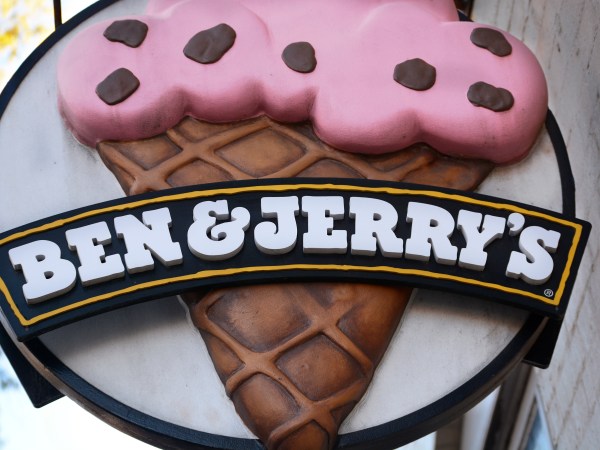 ALEXANDRIA, VA - APRIL 20, 2018:  A business sign hangs over the entrance to a Ben & Jerry's ice cream shop in the Old Town section of Alexandria, Virginia. (Photo by Robert Alexander/Getty Images)
