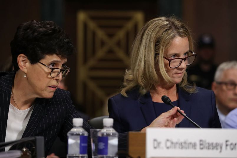 WASHINGTON, DC - SEPTEMBER 27:  Attorney Debra Katz (L) helps her client Christine Blasey Ford as she testifies before the Senate Judiciary Committee in the Dirksen Senate Office Building on Capitol Hill September 27, 2018 in Washington, DC. A professor at Palo Alto University and a research psychologist at the Stanford University School of Medicine, Ford has accused Supreme Court nominee Judge Brett Kavanaugh of sexually assaulting her during a party in 1982 when they were high school students in suburban Maryland.  (Photo by Win McNamee/Getty Images)