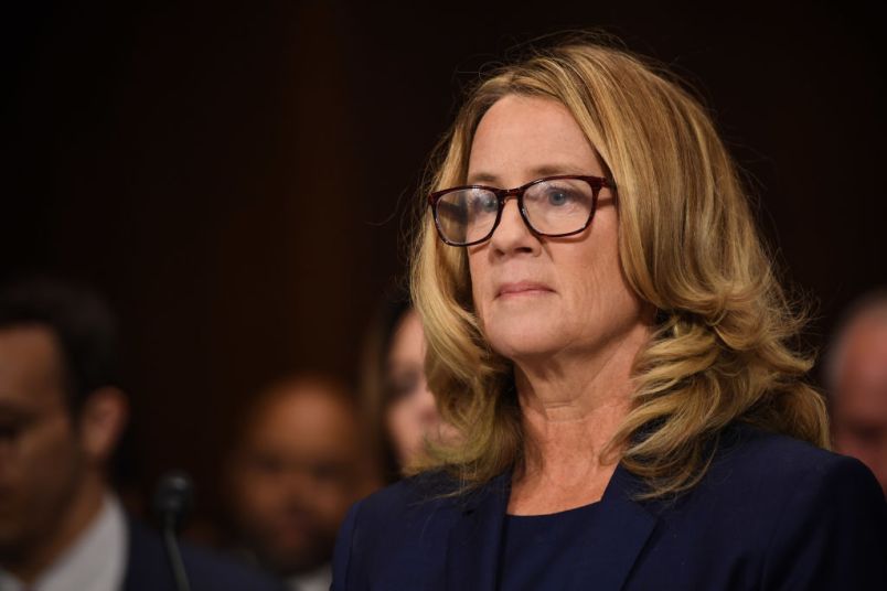 Christine Blasey Ford, the woman accusing Supreme Court nominee Brett Kavanaugh of sexually assaulting her at a party 36 years ago, testifies during his US Senate Judiciary Committee confirmation hearing on Capitol Hill in Washington, DC, September 27, 2018. (Photo by SAUL LOEB / POOL / AFP)        (Photo credit should read SAUL LOEB/AFP/Getty Images)