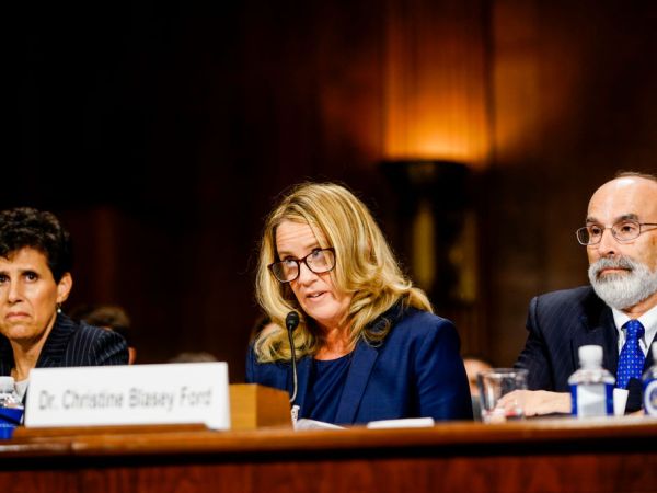 WASHINGTON, DC - SEPTEMBER 27: Christine Blasey Ford, with lawyers Debra S. Katz, left, and Michael R. Bromwich, answers questions at a Senate Judiciary Committee hearing in the Dirksen Senate Office Building on Capitol Hill September 27, 2018 in Washington, DC. A professor at Palo Alto University and a research psychologist at the Stanford University School of Medicine, Ford has accused Supreme Court nominee Judge Brett Kavanaugh of sexually assaulting her during a party in 1982 when they were high school students in suburban Maryland.  (Photo by Melina Mara-Pool/Getty Images)