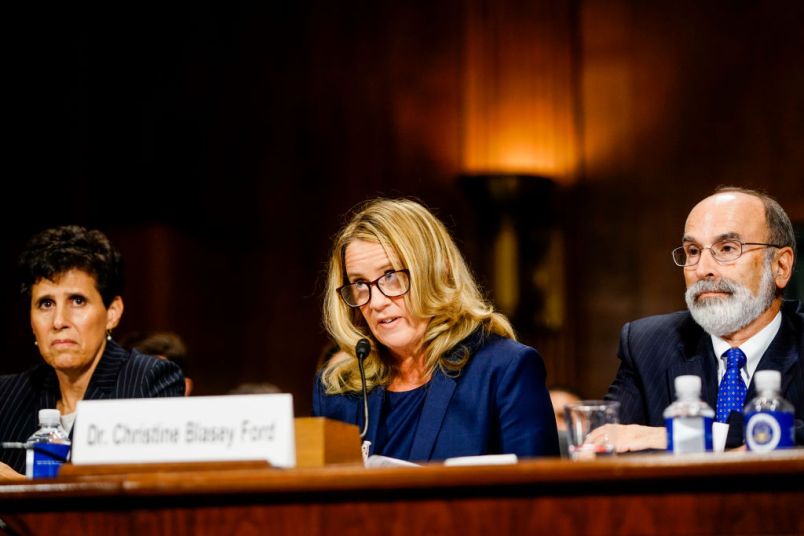 WASHINGTON, DC - SEPTEMBER 27: Christine Blasey Ford, with lawyers Debra S. Katz, left, and Michael R. Bromwich, answers questions at a Senate Judiciary Committee hearing in the Dirksen Senate Office Building on Capitol Hill September 27, 2018 in Washington, DC. A professor at Palo Alto University and a research psychologist at the Stanford University School of Medicine, Ford has accused Supreme Court nominee Judge Brett Kavanaugh of sexually assaulting her during a party in 1982 when they were high school students in suburban Maryland.  (Photo by Melina Mara-Pool/Getty Images)