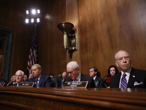 WASHINGTON, DC - SEPTEMBER 27:  Senate Judiciary Committee members (L-R) Sen. John Cornyn (R-TX), Sen. Lindsey Graham (R-SC), Sen. Orrin Hatch (R-UT) and Chairman Charles Grassley listens to testimony from Christine Blasey Ford in the Dirksen Senate Office Building on Capitol Hill September 27, 2018 in Washington, DC. A professor at Palo Alto University and a research psychologist at the Stanford University School of Medicine, Ford has accused Supreme Court nominee Judge Brett Kavanaugh of sexually assaulting her during a party in 1982 when they were high school students in suburban Maryland.  (Photo by Win McNamee/Getty Images)