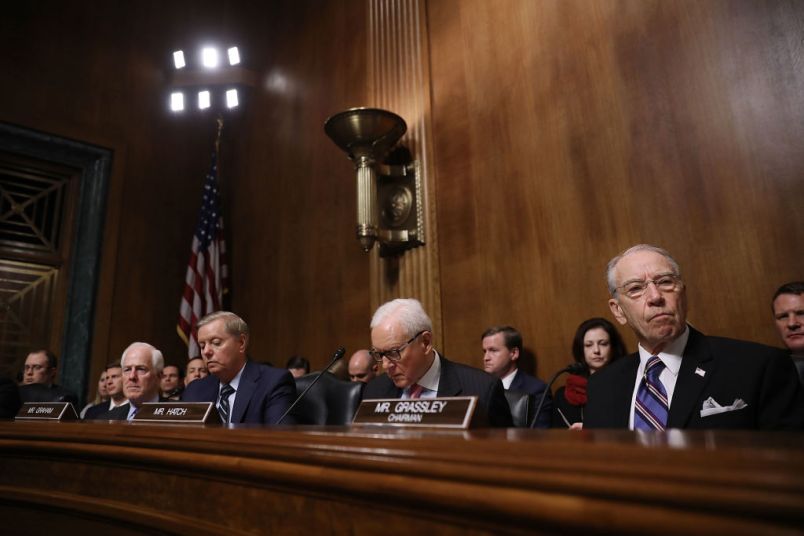 WASHINGTON, DC - SEPTEMBER 27:  Senate Judiciary Committee members (L-R) Sen. John Cornyn (R-TX), Sen. Lindsey Graham (R-SC), Sen. Orrin Hatch (R-UT) and Chairman Charles Grassley listens to testimony from Christine Blasey Ford in the Dirksen Senate Office Building on Capitol Hill September 27, 2018 in Washington, DC. A professor at Palo Alto University and a research psychologist at the Stanford University School of Medicine, Ford has accused Supreme Court nominee Judge Brett Kavanaugh of sexually assaulting her during a party in 1982 when they were high school students in suburban Maryland.  (Photo by Win McNamee/Getty Images)