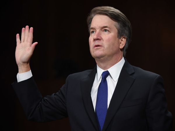 WASHINGTON, DC - SEPTEMBER 27: Supreme Court nominee Judge Brett Kavanaugh takes the oath before the US Senate Judiciary Committee in the Dirksen Senate Office Building on Capitol Hill September 27, 2018 in Washington, DC. A professor at Palo Alto University and a research psychologist at the Stanford University School of Medicine, Ford has accused Supreme Court nominee Judge Brett Kavanaugh of sexually assaulting her during a party in 1982 when they were high school students in suburban Maryland.  (Photo by Saul Loeb-Pool/Getty Images)