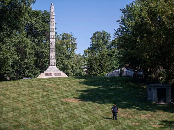 PLEASE HOLD FOR STORY SLUGGED CONFEDERATE CEMETERIES SECURITY BY JIM SALTER -  In this photo made Wednesday, Sept. 19, 2018, a security guard walks the grounds at North Alton Confederate Cemetery in Alton, Ill. The federal government has hired private security firms to guard several Confederate memorials across the U.S in the aftermath of clashes between white nationalists and counter-protesters last year. Information obtained by The Associated Press shows that nearly $3 million has been spent on contracted security since last summer and another $1.6 million is budgeted for similar protection in fiscal 2019. (AP Photo/Jeff Roberson)