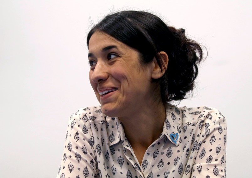 Human rights activist Nadia Murad speaks during an interview with The Associated Press at the International Center in Vienna, Austria, Monday, May 22, 2017. ﻿Murad managed to flee months of IS captivity as a sex slave, But a one-word comment from her shows how deep the scars from the ordeal sit more than two years after her escape. (AP Photo/Ronald Zak)