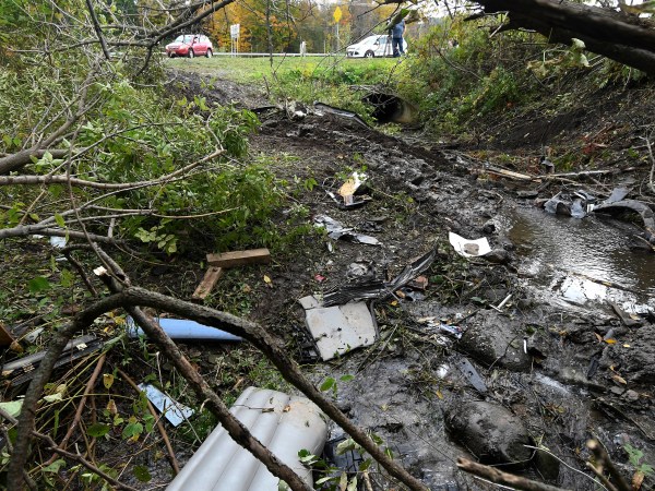 View of the fatal scene where a limousine crashed killing 20 people on Route 30 and 30 A on Oct. 6, 2018 as seen Saturday Oct. 7, 2018, in Schoharie, N.Y. (AP Photo/Hans Pennink)