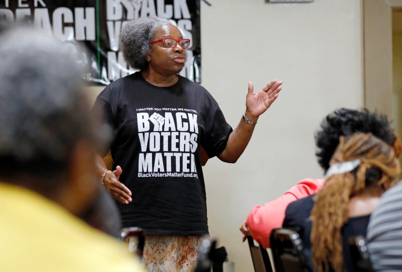 In this Aug. 24, 2018 photo, Betty L. Petty of Sunflower County Parents and Students United, addresses a meeting of the Black Voters Matter Fund and several Mississippi grassroots organizations at MACE, Mississippi Action for Community Education, headquarters in Greenville, Miss. The meeting was in part to introduce national media to hands-on organizations that work throughout the Mississippi Delta to build interest and excitement for the upcoming election, explore local issues, document the campaigning in locales with important upcoming races where black turnout might be key. (AP Photo/Rogelio V. Solis)