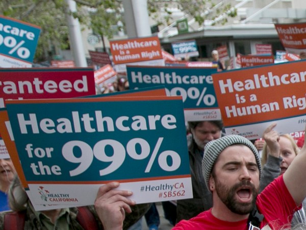 Supporters of single-payer health care march to the Capitol, Wednesday, April 26, 2017, in Sacramento, Calif. A bill, SB562, by Democratic State Senators Ricardo Lara and Toni Atkins, would substantially remake the health care system of the nation's most populous state by eliminating insurance companies and guaranteeing coverage for everyone. (AP Photo/Rich Pedroncelli)