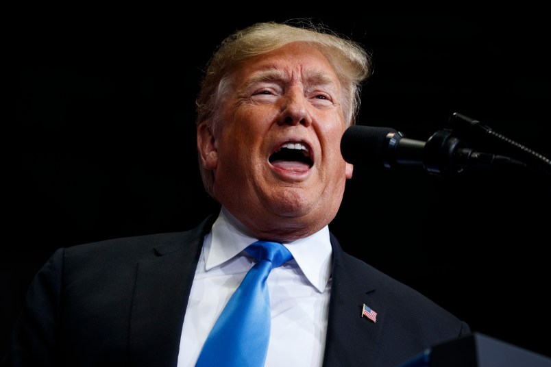President Donald Trump speaks during a campaign rally at Bojangles' Coliseum, Friday, Oct. 26, 2018, in Charlotte, N.C. (AP Photo/Evan Vucci)