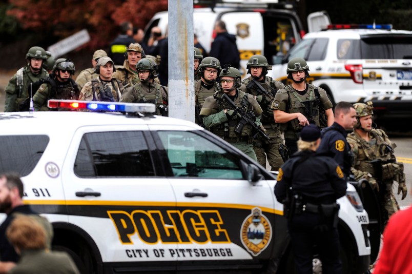Law enforcement officers secure the scene where multiple people were shot, Oct, 27, 2018, at The Tree of Life Congregation synagogue in Squirrel Hill. (Alexandra Wimley/Pittsburgh Post-Gazette via AP)