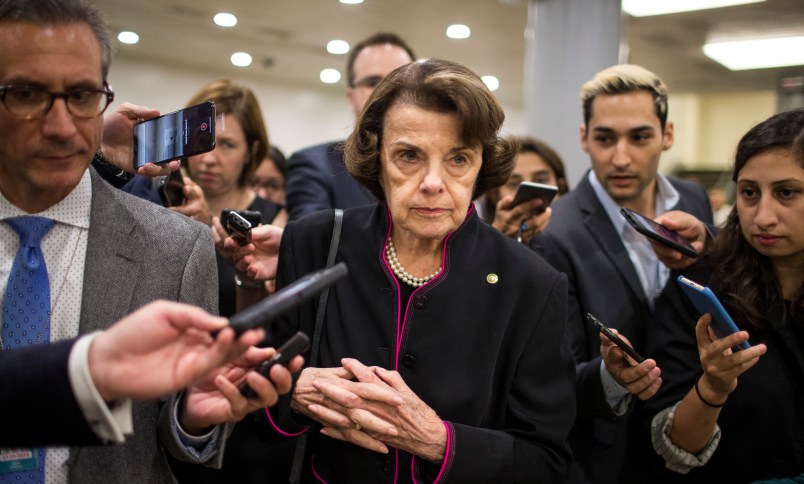 WASHINGTON, DC - SEPTEMBER 27: Senate Judiciary Committee Ranking Member Sen. Dianne Feinstein (D-CA) speaks to members of the press in the Senate Basement on September 27, 2018 in Washington, DC. On Thursday, Christine Blasey Ford, who has accused Kavanaugh of sexual assault, is testifying before the Senate Judiciary Committee.  (Photo by Zach Gibson/Getty Images)