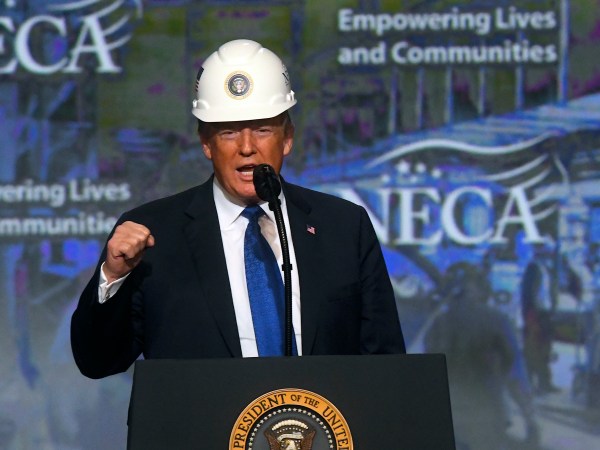 PHILADELPHIA, PA - OCTOBER 2: U.S. President Donald Trump wears a hard hat as he addresses the National Electrical Contractors Convention on October 2, 2018 in Philadelphia, Pennsylvania. The National Electrical Contractors Convention is the largest gathering of manufacturers and distributors for electrical professionals in North America. (Photo by Mark Makela/Getty Images)