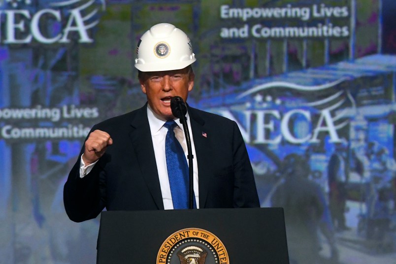 PHILADELPHIA, PA - OCTOBER 2: U.S. President Donald Trump wears a hard hat as he addresses the National Electrical Contractors Convention on October 2, 2018 in Philadelphia, Pennsylvania. The National Electrical Contractors Convention is the largest gathering of manufacturers and distributors for electrical professionals in North America. (Photo by Mark Makela/Getty Images)