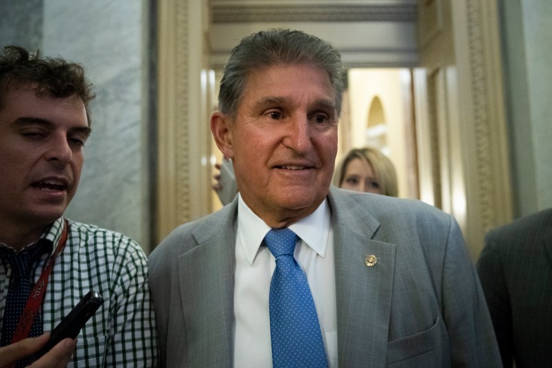 WASHINGTON, DC - OCTOBER 3: Sen. Joe Manchin (D-WV) heads to the Senate floor for a vote, at the U.S. Capitol, October 3, 2018 in Washington, DC. An FBI report on current allegations against Supreme Court nominee Brett Kavanaugh is expected by the end of this week, possibly later today. (Photo by Drew Angerer/Getty Images)
