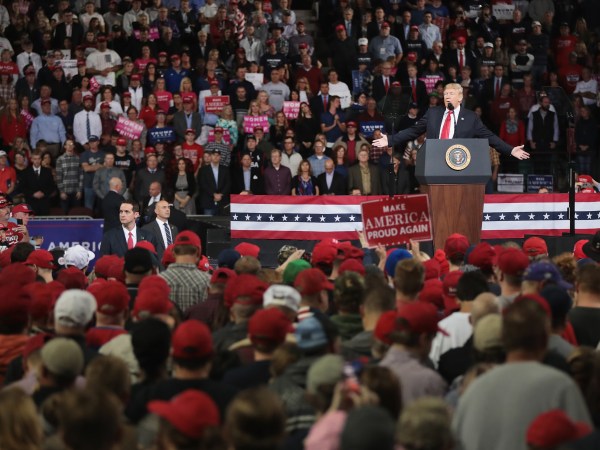TOPEKA, KS - OCTOBER 06:  President Donald Trump speaks to supporters at the Kansas Expocenter on October 6, 2018 in Topeka, Kansas. Trump scored a political victory today when Judge Brett Kavanaugh was confirmed by the Senate to become the next Supreme Court justice.  (Photo by Scott Olson/Getty Images) *** Local Caption *** Sup[