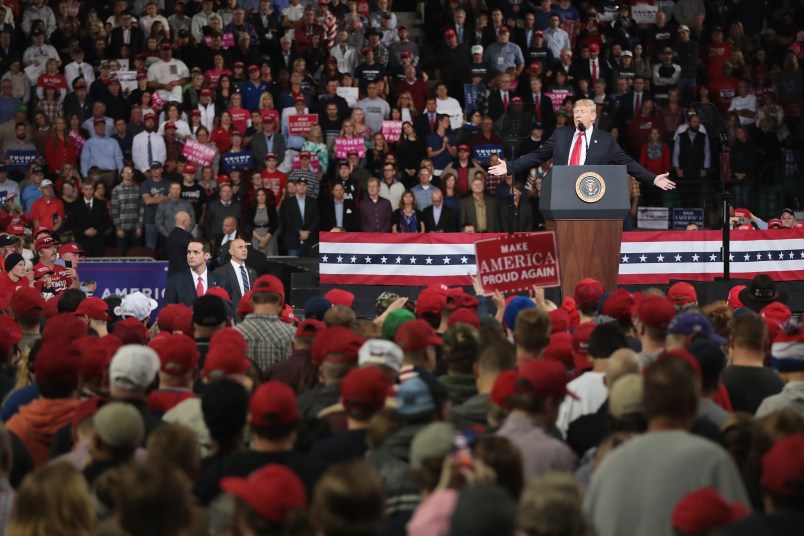 TOPEKA, KS - OCTOBER 06:  President Donald Trump speaks to supporters at the Kansas Expocenter on October 6, 2018 in Topeka, Kansas. Trump scored a political victory today when Judge Brett Kavanaugh was confirmed by the Senate to become the next Supreme Court justice.  (Photo by Scott Olson/Getty Images) *** Local Caption *** Sup[