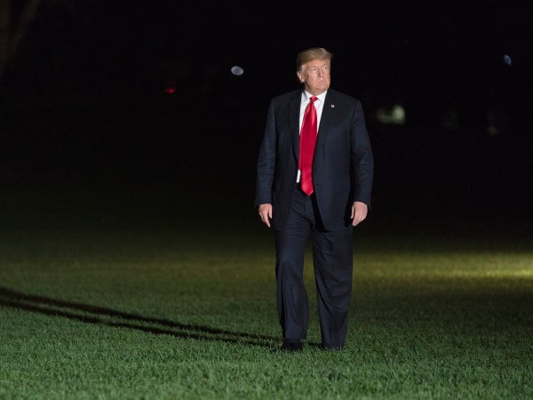 October 10, 2018 - Washington, DC, United States: United States President Donald J. Trump returns to The White House after attending political events in Erie, PA. (Chris Kleponis / Polaris)