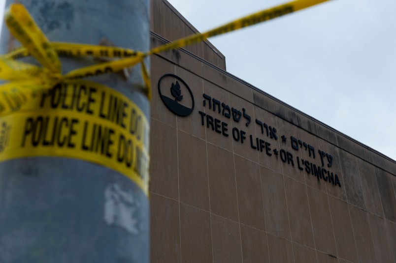 TREE OF LIFE SYNAGOGUE, PITTSBURGH, PENNSYLVANIA, UNITED STATES - 2018/10/29: Police tape wrapped around a traffic light pole out front of the Tree of Life Synagogue in Squirrel Hill outside of Pittsburgh. Members of Pittsburgh and the Squirrel Hill community pay their respects at the memorial to the 11 victims of the Tree of Life Synagogue massacre perpetrated by suspect Robert Bowers on Saturday, October 27. (Photo by Matthew Hatcher/SOPA Images/LightRocket via Getty Images)
