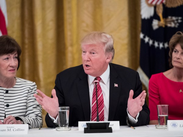 WASHINGTON, DC - JUNE 27: President Donald Trump, center, speaks as he meets with Republican senators about health care in the East Room of the White House of the White House in Washington, DC on Tuesday, June 27, 2017. Seated with him are Sen. Susan Collins, R-Maine, left, and Sen. Lisa Murkowski, R-Alaska, right, (Photo by Jabin Botsford/The Washington Post)