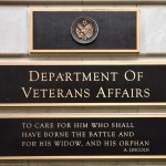 WASHINGTON, D.C. - APRIL 22, 2018:  A metal plaque on the facade of the Department of Veterans Affairs building in Washington, D.C., features a quotation by Abraham Lincoln. (Photo by Robert Alexander/Getty Images)