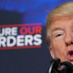 US President Donald Trump speaks on immigration in the South Court Auditorium, next to the White House on June 22, 2018 in Washington, DC, next to people holding posters of victims allegedly killed by illegal immigrants. (Photo by Mandel NGAN / AFP)        (Photo credit should read MANDEL NGAN/AFP/Getty Images)