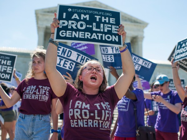 UNITED STATES - JUNE 25: Protesters call for a vote on the NIFLA v. Becerra case outside of the Supreme Court on June 25, 2018. The case involves pro-life pregnancy centers and the requirement by California law to provide information on abortion. (Photo By Tom Williams/CQ Roll Call)