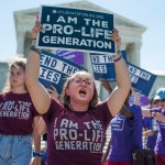 UNITED STATES - JUNE 25: Protesters call for a vote on the NIFLA v. Becerra case outside of the Supreme Court on June 25, 2018. The case involves pro-life pregnancy centers and the requirement by California law to provide information on abortion. (Photo By Tom Williams/CQ Roll Call)