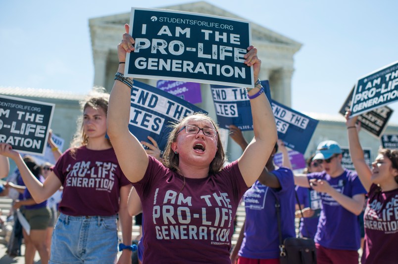 UNITED STATES - JUNE 25: Protesters call for a vote on the NIFLA v. Becerra case outside of the Supreme Court on June 25, 2018. The case involves pro-life pregnancy centers and the requirement by California law to provide information on abortion. (Photo By Tom Williams/CQ Roll Call)