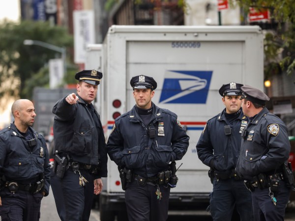 NEW YORK, NY - OCTOBER 26: Law enforcement officials respond to a suspicious package at a U.S. Post Office facility at 52nd Street and 8th Avenue in Manhattan, October 26, 2018 in New York City. The latest package device intercepted in New York City this morning was addressed to former Director of National Intelligence James Clapper. (Photo by Drew Angerer/Getty Images)