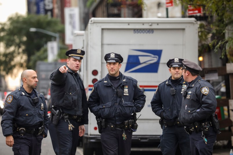 NEW YORK, NY - OCTOBER 26: Law enforcement officials respond to a suspicious package at a U.S. Post Office facility at 52nd Street and 8th Avenue in Manhattan, October 26, 2018 in New York City. The latest package device intercepted in New York City this morning was addressed to former Director of National Intelligence James Clapper. (Photo by Drew Angerer/Getty Images)