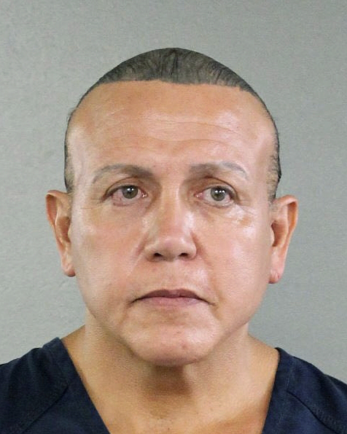 In this undated photo released by the Broward County Sheriff's office, Cesar Sayoc is seen in a booking photo, in Miami. Federal authorities took Cesar Sayoc, 56, of Aventura, Fla., into custody Friday in Florida in connection with the mail-bomb scare that earlier widened to 12 suspicious packages, the FBI and Justice Department said. (Broward County Sheriff's Office via AP)