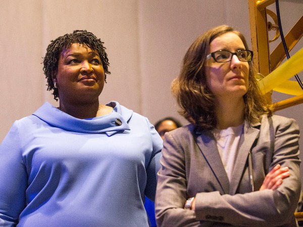 11/07/2018 -- Atlanta, Georgia -- Georgia gubernatorial candidate Stacey Abrams (left) stands with her campaign manager, Lauren Groh-Wargo[cq], before speaking to her supporters during an election night watch party at the Hyatt Regency in Atlanta, Wednesday, November 7, 2018. Georgia's gubernatorial race was too close to call, possibly signaling a run-off election. (ALYSSA POINTER/ALYSSA.POINTER@AJC.COM)