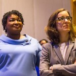 11/07/2018 -- Atlanta, Georgia -- Georgia gubernatorial candidate Stacey Abrams (left) stands with her campaign manager, Lauren Groh-Wargo[cq], before speaking to her supporters during an election night watch party at the Hyatt Regency in Atlanta, Wednesday, November 7, 2018. Georgia's gubernatorial race was too close to call, possibly signaling a run-off election. (ALYSSA POINTER/ALYSSA.POINTER@AJC.COM)