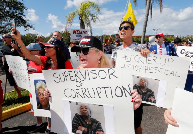 A crowd protests outside the Broward County Supervisor of Elections office Nov. 9, 2018, in Lauderhill, Fla.  (AP Photo/Joe Skipper)