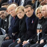 (From L) Canadian Prime Minister Justin Trudeau, Morocco's Prince Moulay Hassan, Moroccan King Mohammed VI, US First Lady Melania Trump, US President Donald Trump, German Chancellor Angela Merkel, French President Emmanuel Macron and his wife Brigitte Macron, Russian President Vladimir Putin and Australian Governor-General Peter Cosgrove attend a ceremony the Arc de Triomphe in Paris, France, as part of the commemorations marking the 100th anniversary of the 11 November 1918 armistice, ending World War I, Sunday, Nov. 11, 2018. (Ludovic Marin/Pool Photo via AP)