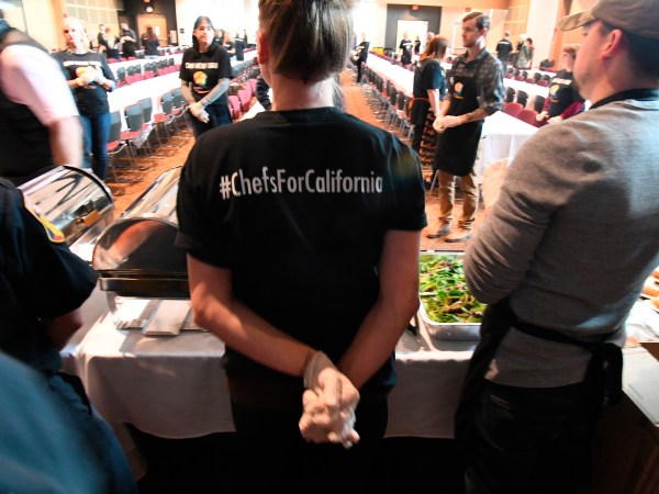 /// Katya Phillips, 33, stands ready to serve evacuees from the Camp Fire a Thanksgiving meal on Nov. 22, 2018. Phillips volunteered to serve others even though she was among the thousands of Paradise residents who lost their homes in the fire. "We lost everything, but we still have our hearts," Phillips said.Benjamin SpillmanReno Gazette Journal/USA TODAY NetworkRGJ.com@ByBenSpillman775-788-6435