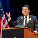 In this Jan. 5, 2018 photo, T.J. Cox, a candidate for the 21st U.S. Congressional District, speaks at a Democratic Party debate at the Gallo Center for the Arts in Modesto. Cox has edged ahead of Republican David Valadao in a U.S. House race in California's farm belt, where votes continue to be counted. Cox has trailed since election night but pulled ahead by 438 votes Monday, Nov. 26, 2018, according to tallies in the 21st District that cuts through four Central Valley counties. The Associated Press had declared Valadao the winner, but votes that have been counted since Nov. 6 narrowed the race and the AP retracted its race call on Monday. (Andy Alfaro/Modesto Bee via AP)