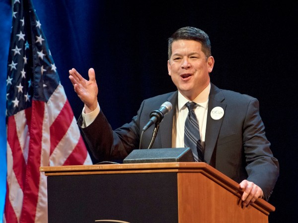 In this Jan. 5, 2018 photo, T.J. Cox, a candidate for the 21st U.S. Congressional District, speaks at a Democratic Party debate at the Gallo Center for the Arts in Modesto. Cox has edged ahead of Republican David Valadao in a U.S. House race in California's farm belt, where votes continue to be counted. Cox has trailed since election night but pulled ahead by 438 votes Monday, Nov. 26, 2018, according to tallies in the 21st District that cuts through four Central Valley counties. The Associated Press had declared Valadao the winner, but votes that have been counted since Nov. 6 narrowed the race and the AP retracted its race call on Monday. (Andy Alfaro/Modesto Bee via AP)