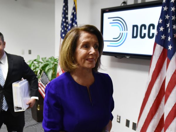 House minority leader Nancy Pelosi, D-CA, departs after a press conference with Democratic Congressional Campaign Committee  Chairman Ben Ray Lujan at Democratic National Committee headquarters in Washington, DC on November 6, 2018. - Americans started voting Tuesday in critical midterm elections that mark the first major voter test of US President Donald Trump's controversial presidency, with control of Congress at stake. (Photo by MANDEL NGAN / AFP)        (Photo credit should read MANDEL NGAN/AFP/Getty Images)