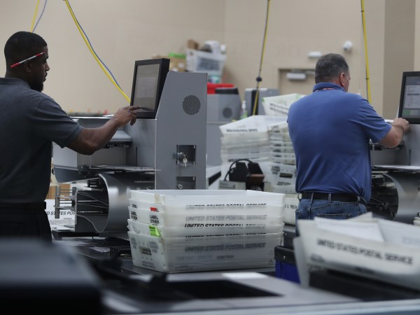 Employees of the Broward County Supervisor of Election's office in Lauderhill, Fla. counts ballots from the Mid-term election Thursday, Nov. 8, 2018. (Carline Jean/Sun Sentinel/TNS)