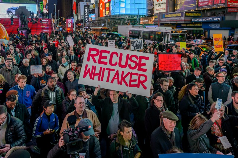 TIMES SQUARE, NEW YORK, UNITED STATES - 2018/11/08: Thousands of New Yorkers joined a coalition of grassroots organizations in New York City in a massive demonstration in Times Square to denounce new acting Attorney General Matthew Whitaker may have a conflict of interest and must not oversee the investigation led by Special Counsel Robert Mueller into Russian interference in the 2016 election and related crimes by Trump campaign officials and associates. (Photo by Erik McGregor/Pacific Press/LightRocket via Getty Images)