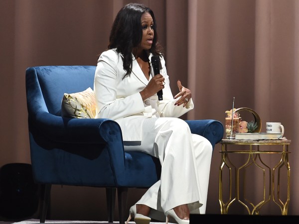 Former First Lady and author Michelle Obama speaks onstage with Tracee Ellis Ross at Becoming: An Intimate Conversation with Michelle Obama at the Forum on November 15, 2018 in Inglewood, California.