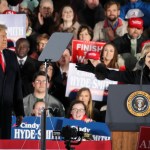 TUPELO, MS - NOVEMBER 26: (L-R) President Donald Trump looks on as Republican candidate for U.S. Senate Cindy Hyde-Smith thanks him during a rally at the Tupelo Regional Airport, November 26, 2018 in Tupelo, Mississippi. President Trump is holding two rallies on Monday in Mississippi, in support of Republican candidate for U.S. Senate Cindy Hyde-Smith. Hyde-Smith faces off against Democratic candidate Mike Espy in a runoff election on Tuesday. (Photo by Drew Angerer/Getty Images)