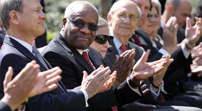 U.S. Supreme Court Associate Justice Anthony Kennedy administers the judicial oath to Judge Neil Gorsuch as President Donald Trump looks on during a ceremony in the Rose Garden at the White House April 10, 2017 in Washington, DC. Earlier in the day Gorsuch, 49, was sworn in as the 113th Associate Justice in a private ceremony at the Supreme Court.