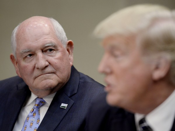 Agriculture secretary Sonny Perdue looks on  as President  Donald Trump speaks during a roundtable with farmers in the Roosevelt Room of the White House in Washington, DC, on April 25, 2017. Photo by Olivier Douliery/ Sipa USA