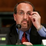 WASHINGTON - JUNE 05:  Bradley Schlozman, associate counsel to the director of the Executive Office for United States Attorneys, and former interim U.S. attorney for the Western District of Missouri, adjusts his glasses as he testifies during a hearing before the Senate Judiciary Committee on Capitol Hill June 5, 2007 in Washington, DC. The hearing focused on prosecutorial independence of the Justice Department and the firing of the eight U.S .Attorneys.  (Photo by Alex Wong/Getty Images) *** Local Caption *** Bradley Schlozman